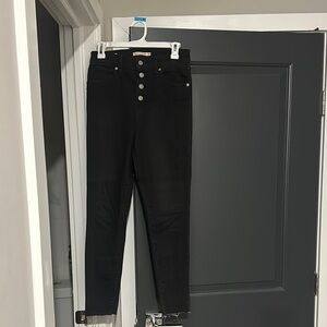 Sleek Black High Rise Jeans